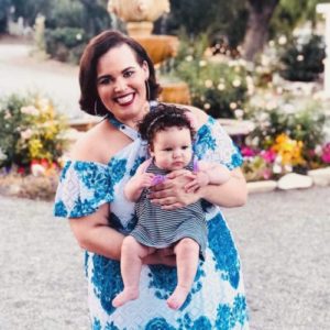 image of Erica Flores holding a baby 